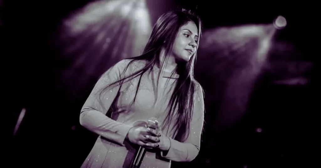 Madhumita Chakraborty performing on stage, representing the Best Classical Music Teacher in Kolkata and inspiring students through Indian classical singing at Giti Alekhya Music School.