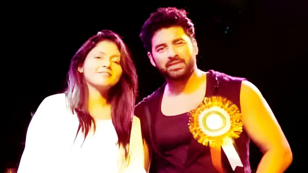 Madhumita Chakraborty shares the stage with popular Bengali actor Ankush Hazra during a live cultural event, celebrating music and performance in Kolkata.