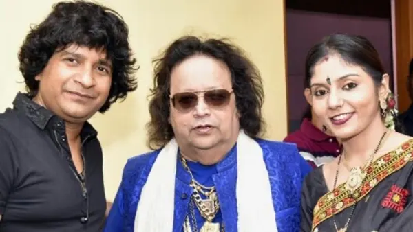 Madhumita Chakraborty captured in a memorable moment with legendary music director Bappi Lahiri and renowned playback singer KK after a live musical performance, celebrating the spirit of Indian music.